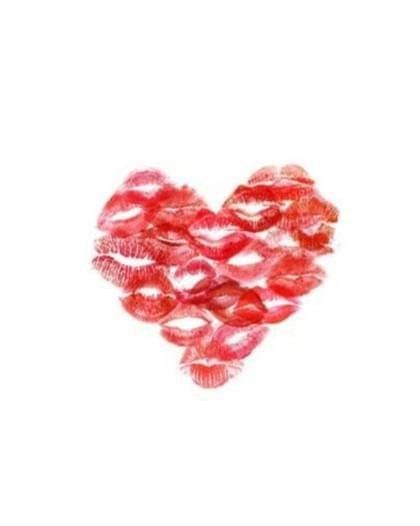 a heart made out of lipstick on a white background