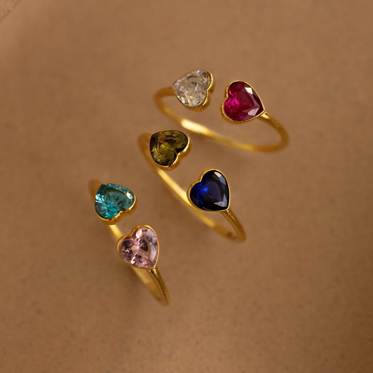 Introducing our Duo Heart Birthstone Ring, featuring two delicately crafted heart-shaped gemstones of your choice. Symbolizing love and connection, this elegant ring is perfect for celebrating special relationships, cherishing meaningful moments and adding a touch of personalized charm to your jewelry collection ♡ SKU: MM-RM126 Product Details Material: High Quality Solid 925 Sterling Silver Finish: 18K Gold ∙ Sterling Silver ∙ Rose Gold Featuring two ~6mm Heart-Shaped CZ Gemstones on a dainty ~ Heart Ring With Birthstone For Promise, Open Heart Ring With Birthstone For Promise, Heart Birthstone Promise Ring With Open Design, Dainty Heart Ring With Birthstone For Anniversary, Promise Heart Ring With Birthstone, Fine Jewelry Heart Ring With Birthstone For Promise, Heart-shaped Birthstone Ring For Mother's Day, Dainty Heart-shaped Birthstone Ring For Anniversary, Dainty Heart-shaped Birthstone Ring For Wedding