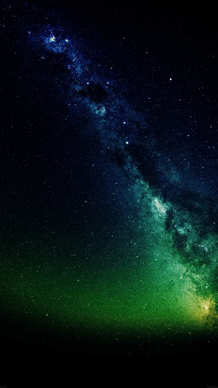 the night sky is filled with bright green and blue stars