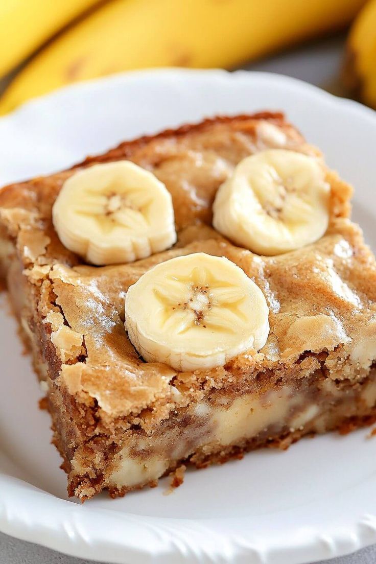 a piece of cake with bananas on top