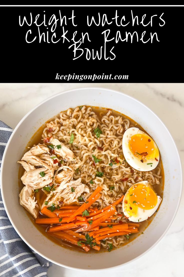 chicken ramen soup in a bowl with an egg and carrots on the side