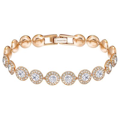 Pure, timeless sophistication. With a stunning mix of rose gold-plated metal and crystal pavé, this beautiful Swarovski bracelet adds a feminine sparkle to any look. It combines perfectly with other pieces from the Angelic family.- Bracelet is crafted of fine quality rose metal for durability- Bracelet measures 6 3/4" long- Swarovski's enduring quest for innovation, beauty and excellence is characteristic of their exquisite designs- Free cleaning and inspection at Day's for life of this Swarovsk Halo Bracelet, Clear Crystal Bracelet, Crystal Stone Jewelry, Swarovski Bracelet, Crystal Bangle, White Bracelets, Rose Gold Bracelet, Gold Plated Bracelets, Swarovski Jewelry