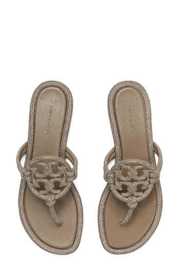 Tonal pavé crystals flood the slender straps and signature medallion of this glitzy sandal set on a slender, cushioned footbed. Flat sole Leather upper and lining/rubber sole Imported Tory Burch Miller, Sandal Women, Christmas List, Women's Shoes Sandals, Tory Burch, Rubber Sole, Womens Sandals, Shoes Sandals, Leather Upper