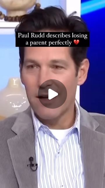 a man in a suit and tie is talking on the tv show paul rudd describes losing a parent perfectly