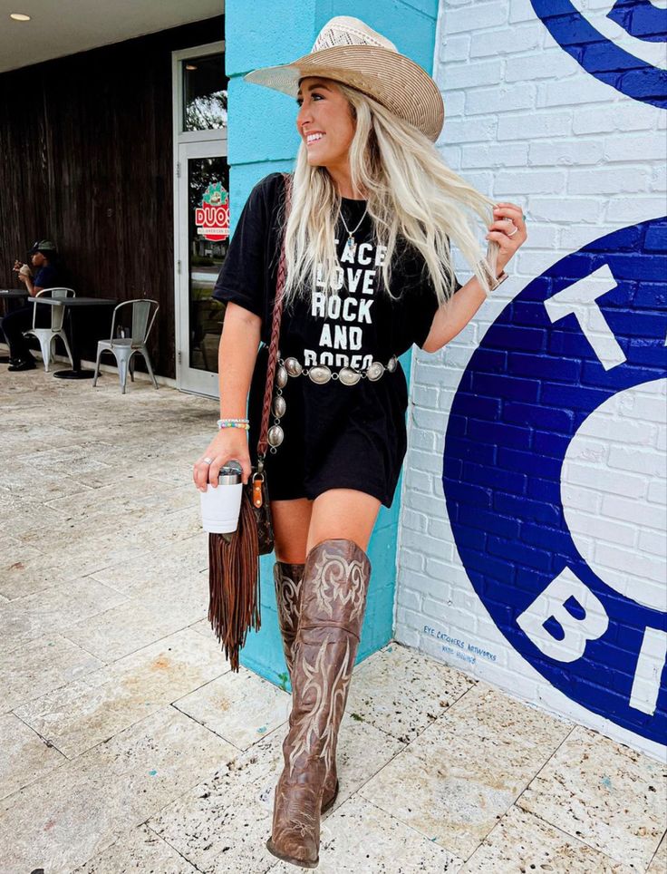 T Shirt And Cowgirl Boots Outfit, Western Tee Shirt Dress, 2024 Rodeo Outfits, Graphic Tshirt Dress Outfit Western, Tshirt Dress Western Outfit, Western T Shirt Outfit, Tshirt Western Outfits, Oversized Country Tshirt Outfit, Tshirt Dress Concert Outfit