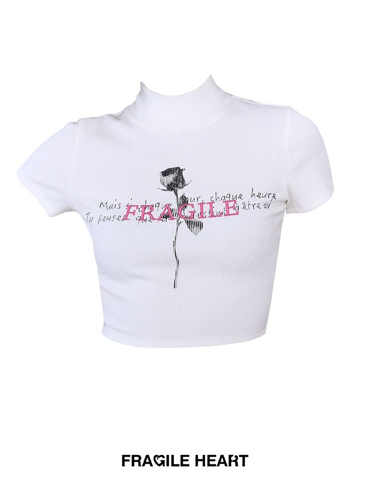 a white crop top with the words fragile heart on it and a flower in pink