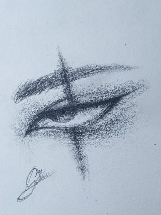 a pencil drawing of an eye and cross