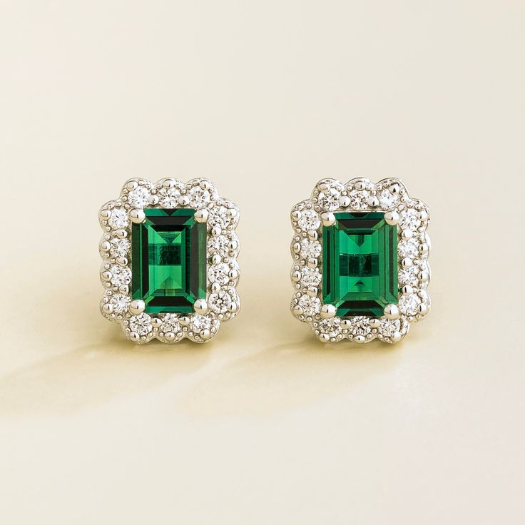 Verda earrings in 18K white gold vermeil set with Emeralds and Diamonds.  Emeralds: ~1. 6 carats (7mm x 5mm emerald cut) Diamonds D-F VS+ grade: ~0. 7 carats Each earring dimensions: 11. 3mm height x 9. 1mm width x 4. 3mm depth Options available in 9K, 14K and 18K gold and additional sizes available, please contact Juvetti. See matching Verda necklace Our precious jewellery is designed to preserve its original brilliance over time. There are a few precautions to make sure to keep your jewellery Elegant Green Platinum Jewelry, Formal Platinum Earrings With Gemstone, Formal Platinum Gemstone Earrings, Elegant Emerald Earrings For Formal Occasions, Elegant Formal Emerald Earrings, Elegant Platinum Emerald Cut Diamond Earrings, White Gold Diamond Earrings In Platinum, Platinum Diamond Earrings In White Gold, White Gold Diamond Earrings With Gemstones In Platinum