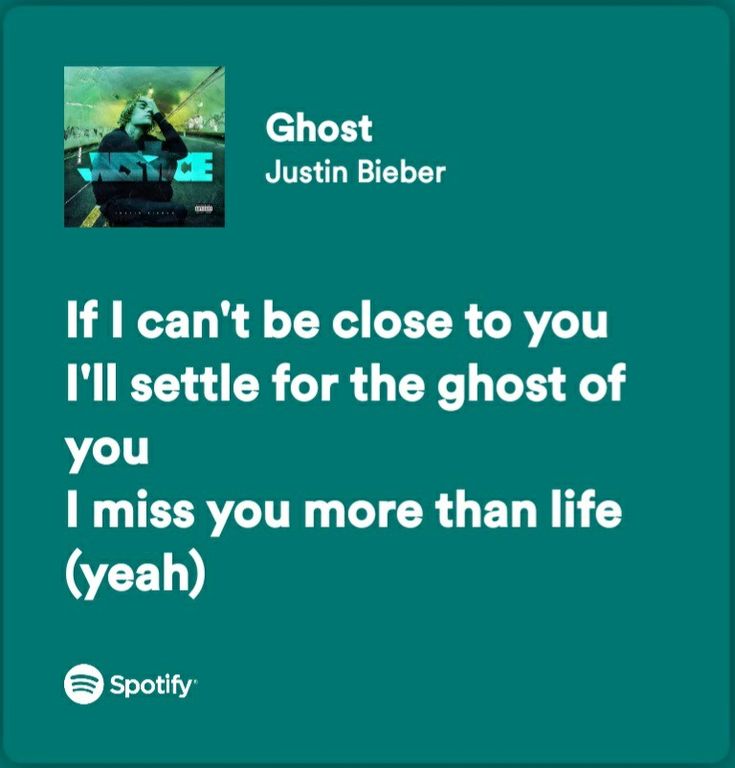 a green background with the words ghost written on it and an image of a man sitting in