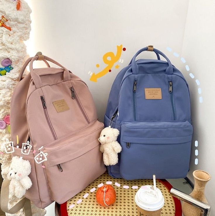 Features: Be excited to go back to school with our new Double The Zipper Large Canvas Backpacks. Made to be ultra-cute yet also extremely sturdy and completely waterproof canvas material, perfect for carrying all of your necessities to school! Comes in 5 adorable colors that can easily match any of your cute school uniforms/outfits and a free plushie chain with every purchase! Dimensions: 32cm x 42cm x 12cm Cute Korean Backpack, Korean Backpack, Cool Backpack, High School Backpack, Canvas Backpacks, Back To School Bags, Striped Bags, Backpack Women, Colorful Bags