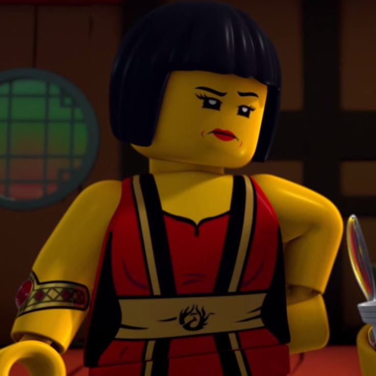 the lego movie character is holding a knife