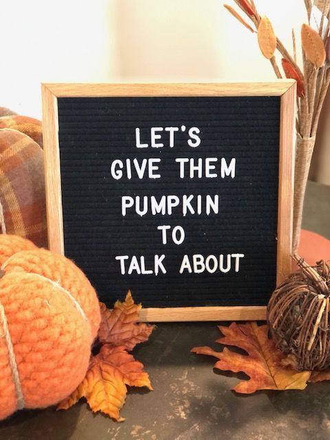 a sign that says let's give them pumpkin to talk about