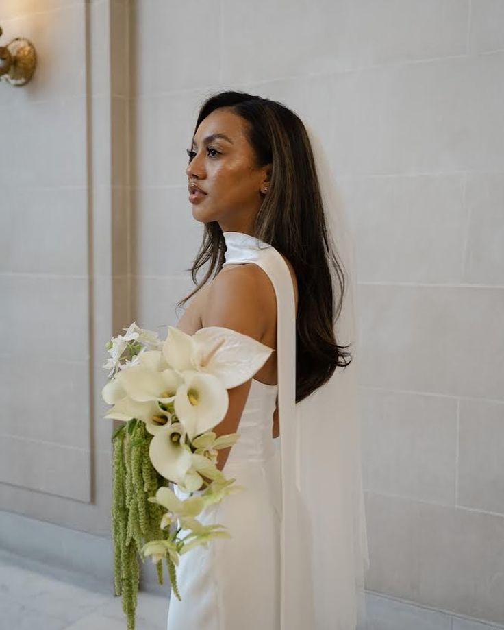 Stunning bride and a modern bouquet full of phalaenopsis orchids, calla lilies, and everyone’s favorite amaranthus 🌿 Photo by @elizabethpishalphoto Wedding | Bridal bouquet | Bay Area Weddings #sfflorist #bayareaflorist #floraldesign #weddingflorals #ihavethisthingwithflowers #myfloraldays #iloveflorists #weddingbouquet #bouquet #floralarrangement #underthefloralspell #floralinspiration #floralstories #botanicalpickmeup #flowersmakemehappy #justbefloral #flowermagic #moodforfloral #pursuepr... Calla Lillies Bouquet Aesthetic, Bridal Bouquet With Calla Lilies, Bridal Bouquet With Amaranthus, Cascading Calla Lily Bouquet, Calls Lilly Bouquet, Calls Lily Wedding Bouquet, Calla Lily Orchid Bouquet, Calalilly Bouquet Modern, Orchid Wedding Florals