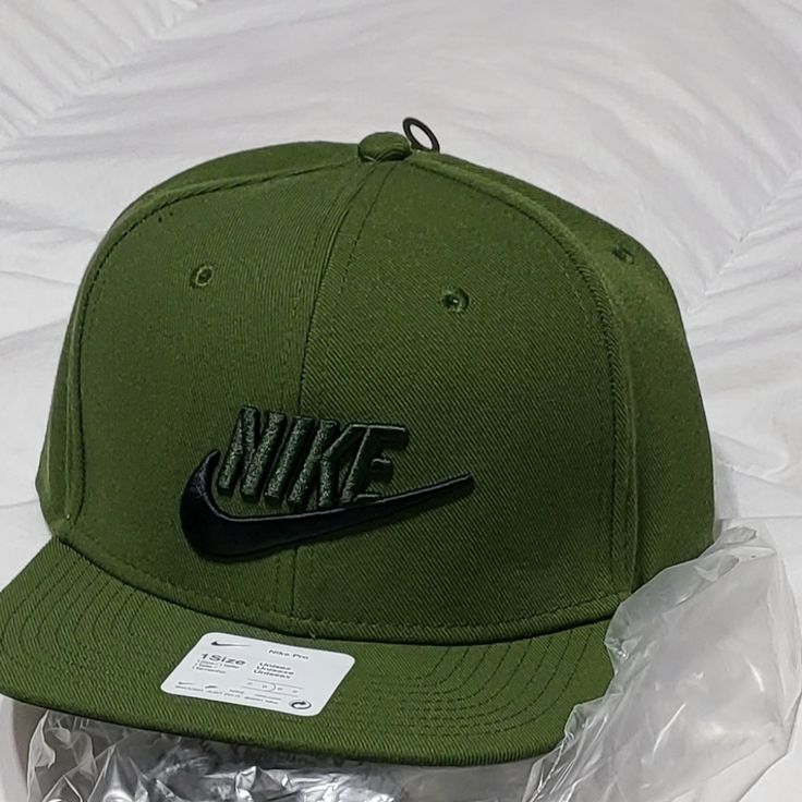 This Is A Brand New Nike Snap Back Cap Olive Green. Nike Baseball Cap, One Size Fits Most, Nike Casual Snapback Hat, Nike Cap For Streetwear, Casual Green Baseball Cap For Winter, Casual Green Hat With Flat Brim, Casual Green Flat Brim Hat, Green Snapback Baseball Cap For Winter, Nike Casual Adjustable Snapback Hat, Green Snapback Hat For Streetwear With Short Brim