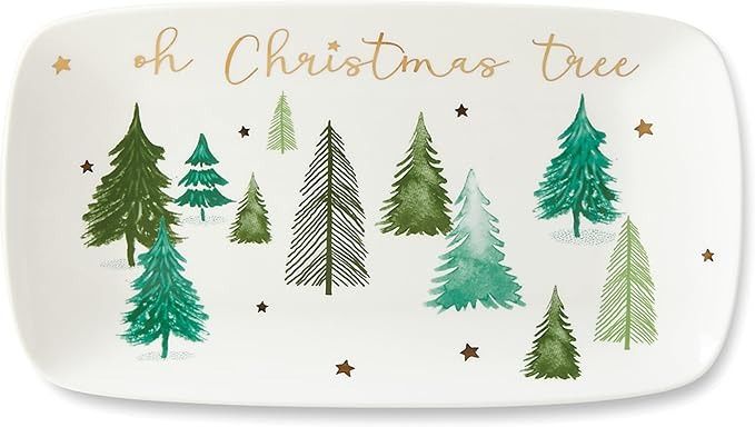 a christmas tree platter with gold lettering on the bottom and green trees painted on it