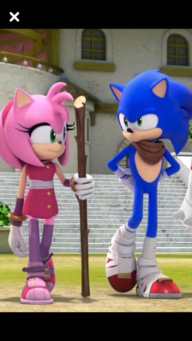 sonic the hedgehog and other characters are standing in front of an empty stadium area