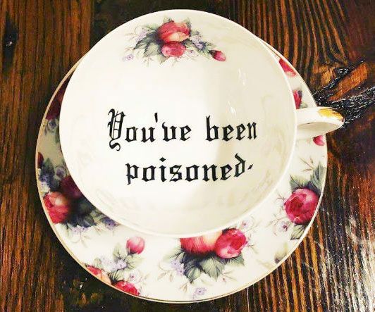 a cup and saucer with the words you're been prisoned on it