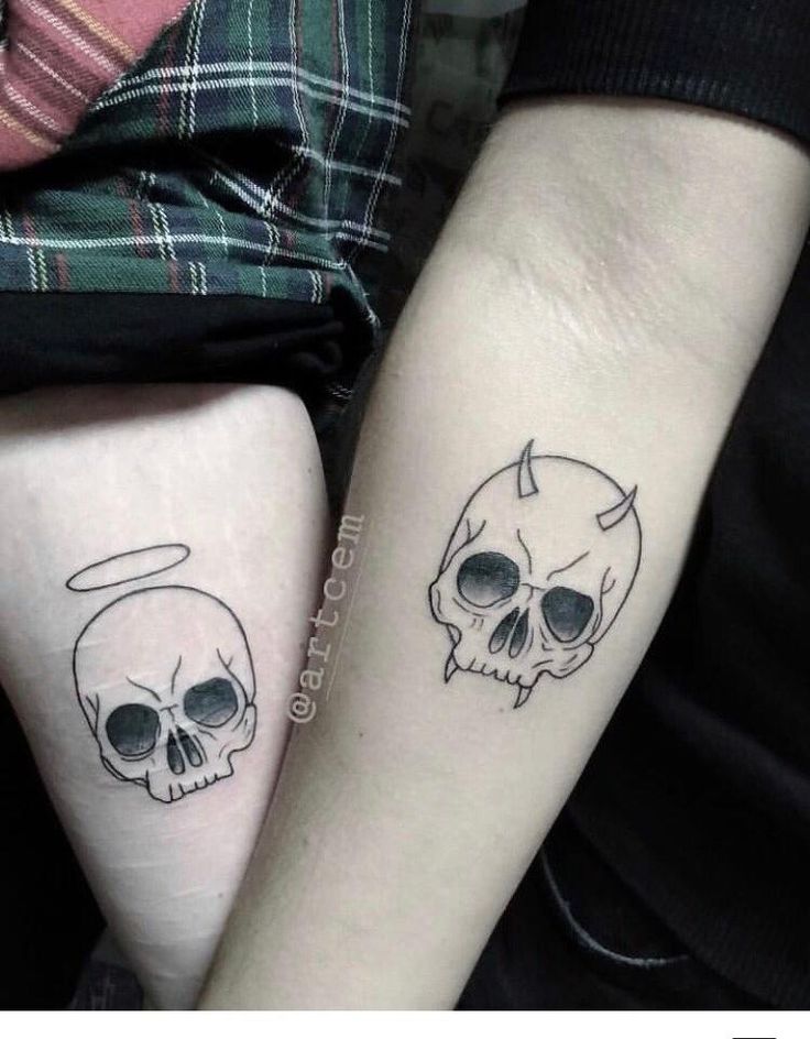 two tattoos with skulls on their arms