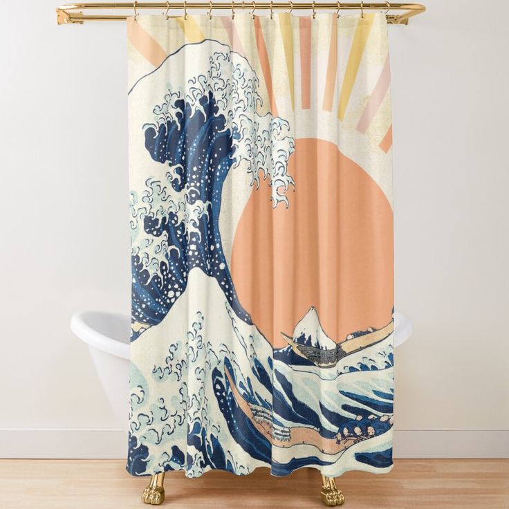 the great wave shower curtain is shown in this bathroom scene with an orange sun behind it