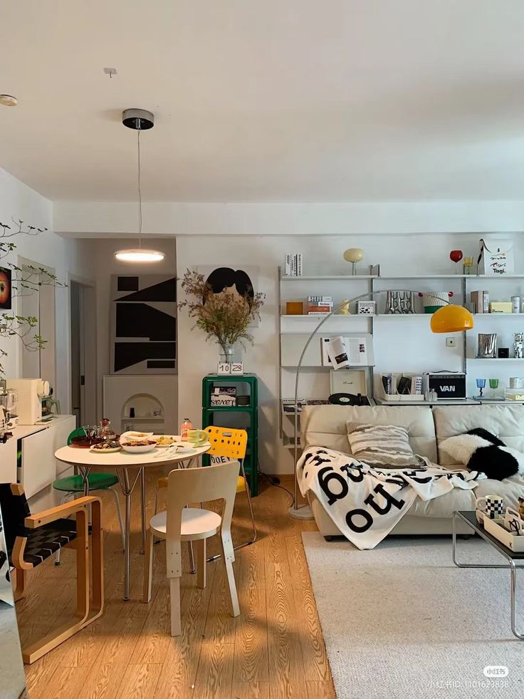 a living room filled with furniture and decor