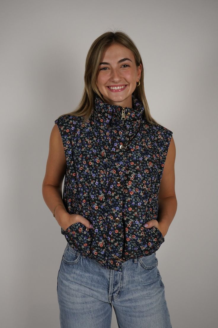 Introducing the Styx Puffer Vest, designed for both style and function. This vest features a unique floral front zipper and snaps, adding a touch of elegance to your look. With its functional design, you can easily layer this vest for added warmth and comfort. Elevate your wardrobe with the Styx Puffer Vest. Size + Fit Olivia is 5’7” and wearing a size Small Content + Care 100% Polyester Wash at 40° Max Sneaker Heels Wedges, Outerwear Vest, Crop Top Sweater, Little White Dresses, Active Wear Outfits, Country Chic, Puffer Vest, Matching Dresses, Dress Romper