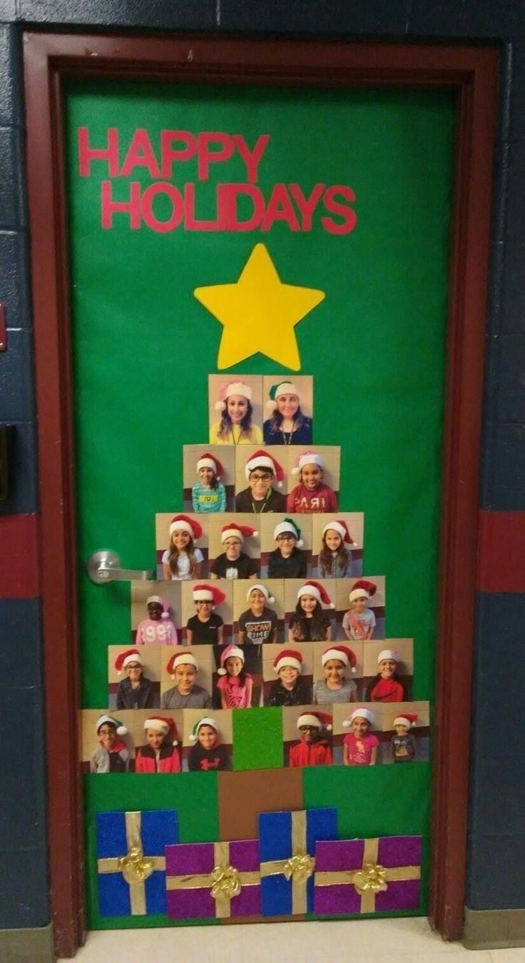 a door decorated to look like a christmas tree with pictures on it and the words happy holidays