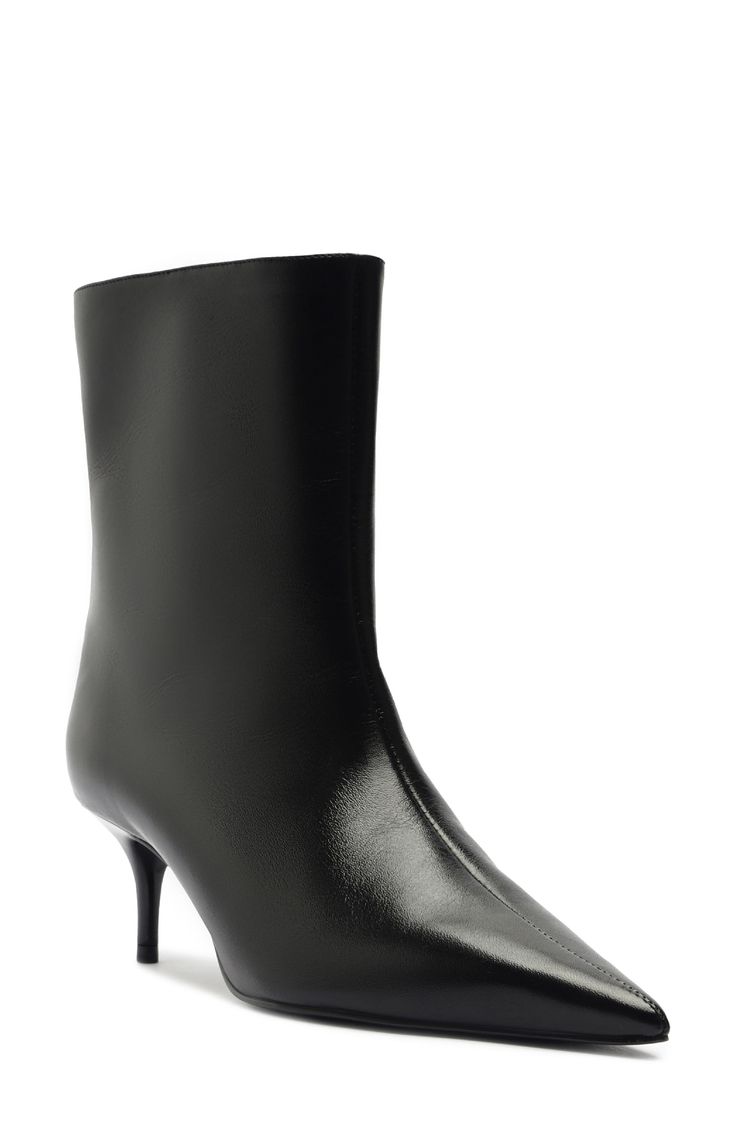 A pointy toe and tapered heel balance a sleek leather bootie that will complement your polished looks. 2 1/4" heel Pull-on style Leather upper, lining and sole Made in Brazil Classic Pointed Toe Boots With 4-inch Heel, Sleek Mid-calf Boots With Reinforced Heel, Calf Leather Heeled Boots With 4-inch Pointed Toe, Sleek Heeled Boots With 4-inch Heel For Formal Occasions, Classic High Heel Boots With Sculpted Heel, Classic Boots With Sculpted High Heel, Calf Leather Boots With 4-inch Heel And Pointed Toe, Chic Mid-calf Boots With Pointed Toe And Leather Sole, Sleek Evening Heeled Boots With 4-inch Heel