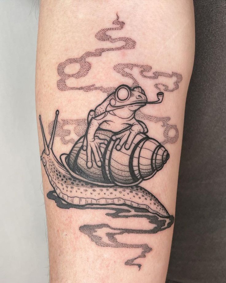 a tattoo with a snail riding on top of a barrel and numbers in the background