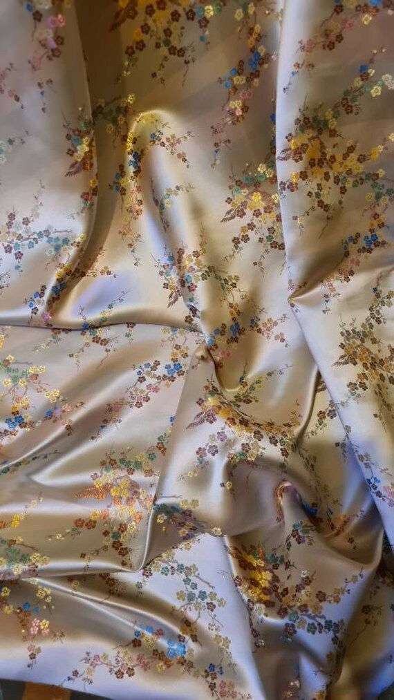 1mtr light gold BIEGE blossom flower design Oriental elegant  fabric. This is really lovely elegant fabric has blossom flower Great to make wedding wear dresses crafts jackets . Price for a mtr . Elegant Beige Wedding Fabric, Wedding Wear Dresses, Elegant Fabric, Dress Crafts, Blossom Flower, Wedding Wear, Elegant Dress, Dress Fabric, Creative Inspiration