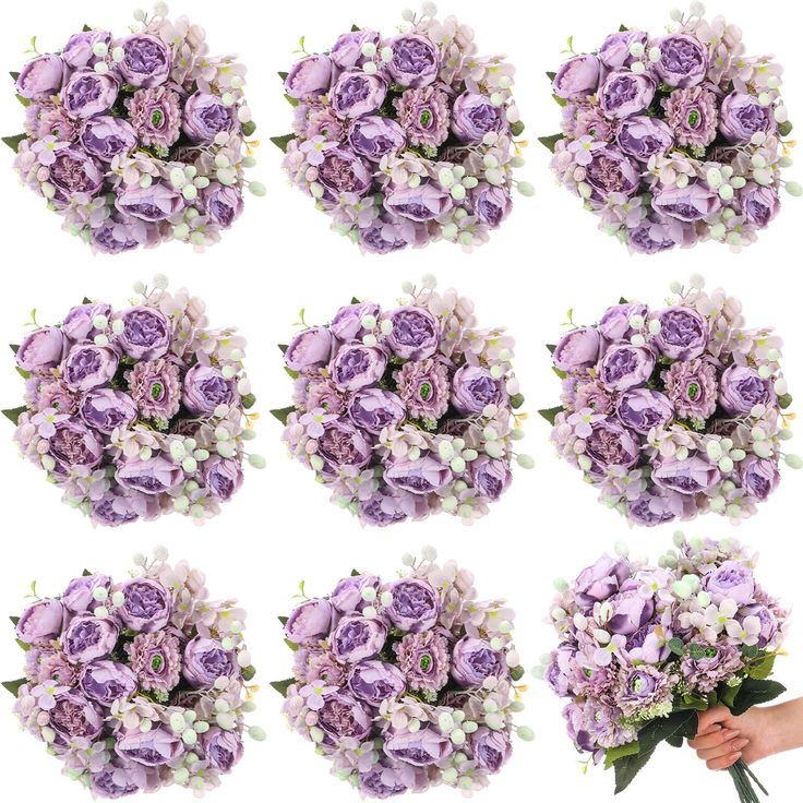 a bunch of purple flowers are arranged in the shape of a bouquet