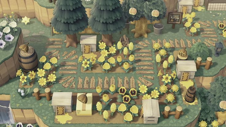 an aerial view of a farm with sunflowers and trees