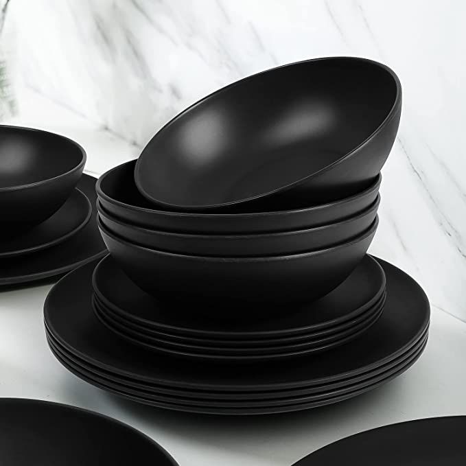 black plates stacked on top of each other