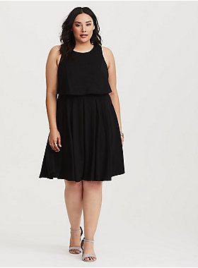 Crafted in a stretchy black ponte fabric, this twofer midi dress features a tank top overlay and a pleated skirt. Ponte fabric Sleeveless Round neck Zipper back Midi length CONTENT + CARE Rayon/nylon/spandex; Lining: polyester Wash cold; line dry Imported SIZE + FIT Model is 5'10" and wearing a Size 1 Size 1 measures 41" from shoulder to hem Modest Work Outfits, Affordable Plus Size Clothing, Perfect Little Black Dress, Mama Style, Plus Size Black, Deep Black, Dress Backs, Plus Size Clothing, Size Clothing