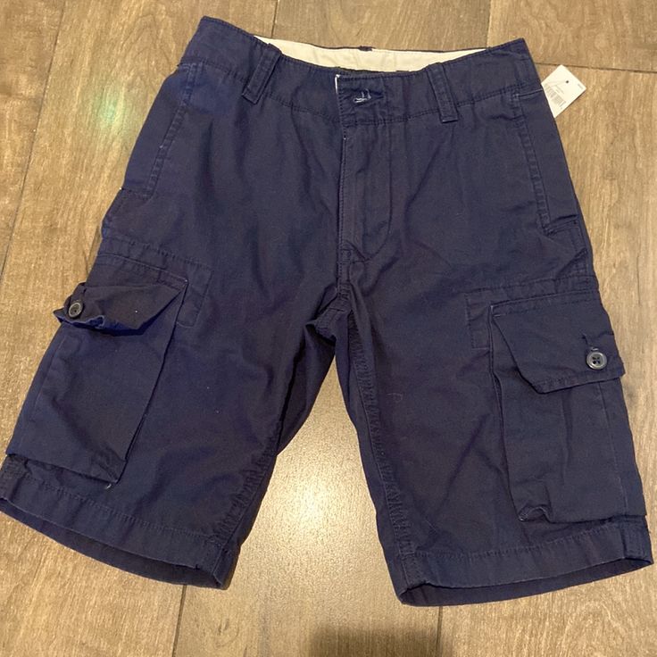 Gap Cargo Shorts, Navy Size 12 Slim. New With Tags. Adjustable Waist. Cotton School Shorts With Pockets, School Cotton Shorts With Pockets, Blue Cotton Cargo Shorts, Blue Cotton Cargo Shorts With Cargo Pockets, Blue Cotton Cargo Shorts With Side Pockets, Blue Cargo Shorts With Side Pockets, Gap Cotton Bottoms With Side Pockets, Navy Cotton Shorts With Short Leg, Gap Cotton Shorts With Pockets