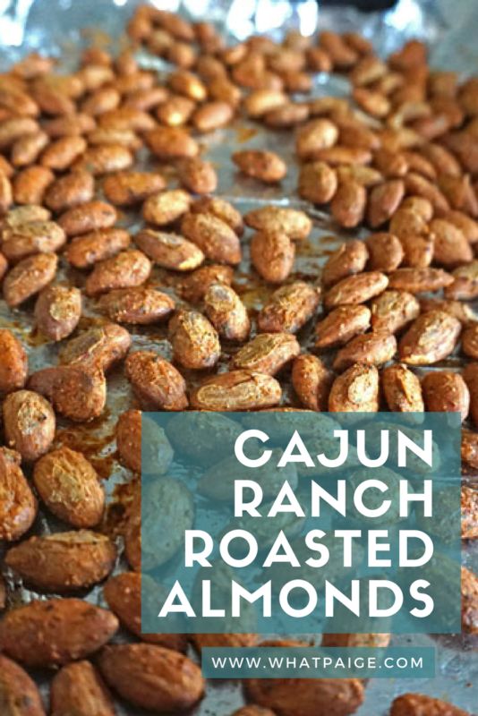 roasted almonds in foil with the words cajun ranch roasted almonds on top