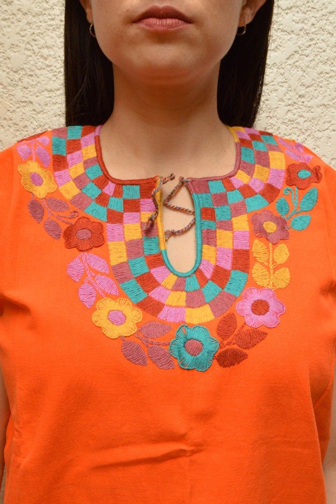 Blouse multicolored handmade by Mexican artisans. . It is important to mention that absolutely all the process is done by hand, so the size, shape and color can varybetween pieces. . Measurements:↕ 26 in↔ 20 6/7 in Orange Embroidered Cotton Blouse, Orange Cotton Blouse With Floral Embroidery, Handmade Multicolor Tops For Spring, Traditional Handmade Multicolor Tops, Traditional Multicolor Handmade Tops, Traditional Multicolor Cotton Embroidered Top, Summer Multicolor Embroidered Top With Embroidered Neckline, Handmade Multicolor Bohemian Tops, Handmade Bohemian Multicolor Tops