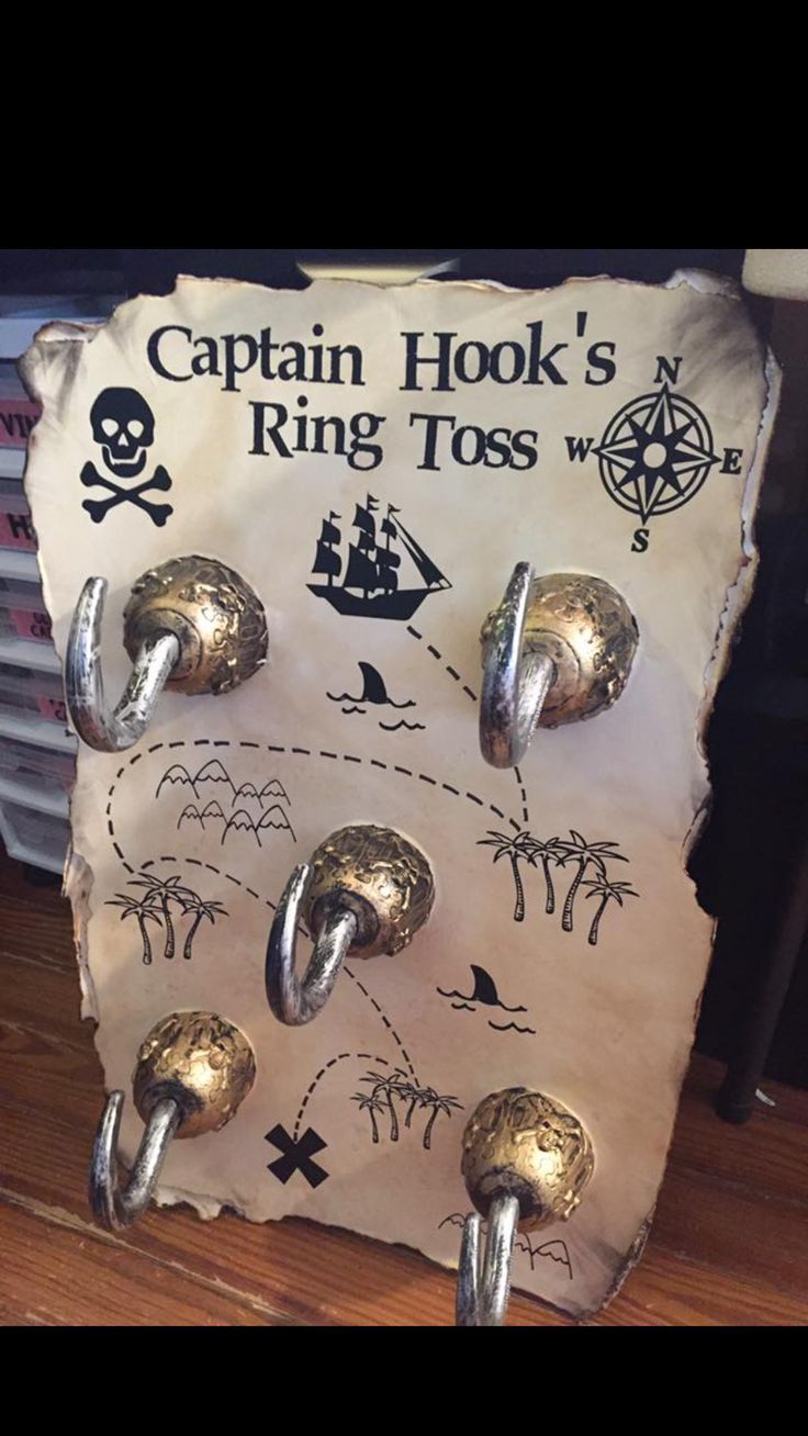 the captain hook's ring tosser is made out of paper and has pirate symbols on it