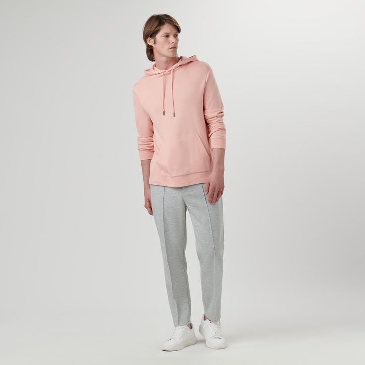 Long-sleeved pullover in soft touch cotton blend with adjustable drawstring hood and kangaroo pockets. Spring Hoodie With Kangaroo Pocket For Loungewear, Spring Loungewear Sweats With Kangaroo Pocket, Relaxed Fit Pink Hoodie With Ribbed Cuffs, Spring Fleece Hoodie With Pockets, Spring Hoodie Sweats With Pockets, Modern Cotton Sweatshirt With Drawstring Hood, Modern Long Sleeve Hoodie With Ribbed Cuffs, Modern Cotton Sweatshirt For Spring, Spring Hoodie Sweats With Kangaroo Pocket