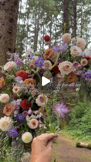 a person holding flowers in front of a tree with the words, this is what i do for all my forest wedding