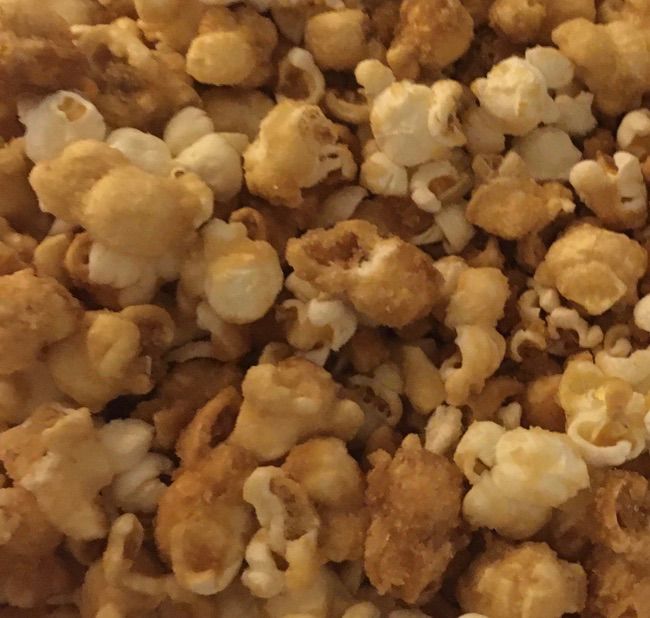 a close up view of popcorn kernels on a table