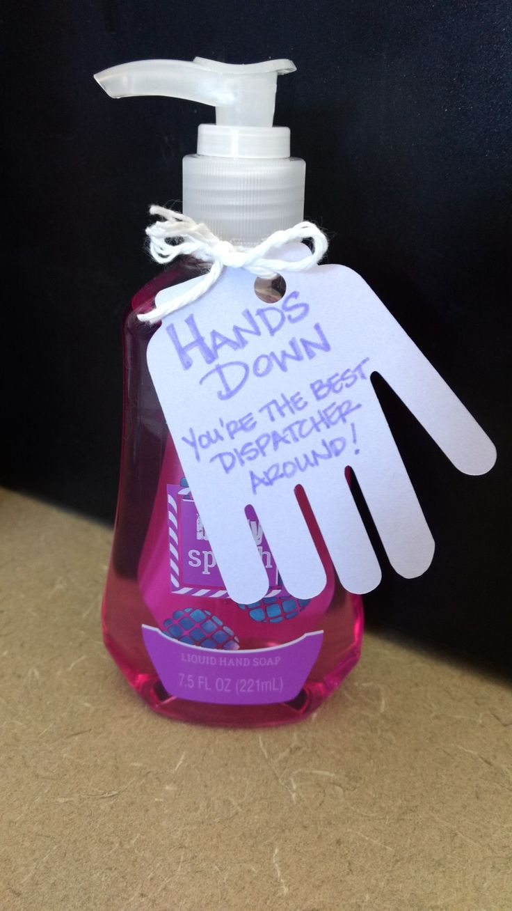 a hand sanitizer is shown on a counter with a tag that says hands down