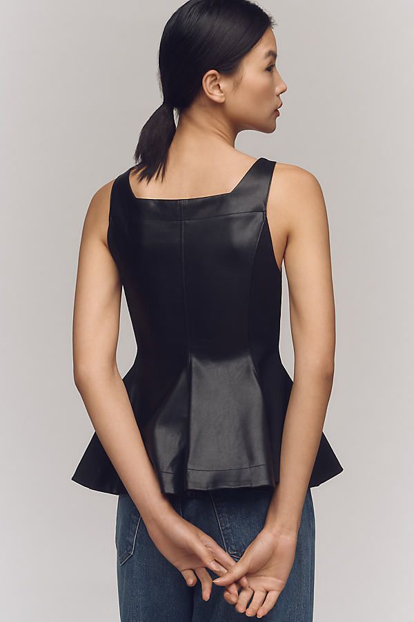 Polyurethane-coated viscose; viscose, polyamide, elastane contrast Front zip Hand wash Imported | Faux-Leather Seamed Corset Top by Anthropologie in Black, Women's, Size: 2XS, Polyamide/Viscose/Elastane Elegant Leather Party Tops, Fitted Faux Leather Top For Work, Fitted Faux Leather Tops For Work, Elegant Leather Tops For Night Out, Elegant Leather Tops For Formal Occasions, Elegant Leather Formal Tops, Elegant Formal Leather Tops, Sleek Leather Tops For Night Out, Elegant Leather Tops For Work