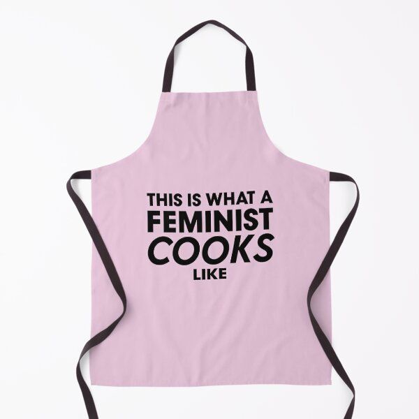 a pink apron that says, this is what a feminist cook's life looks like