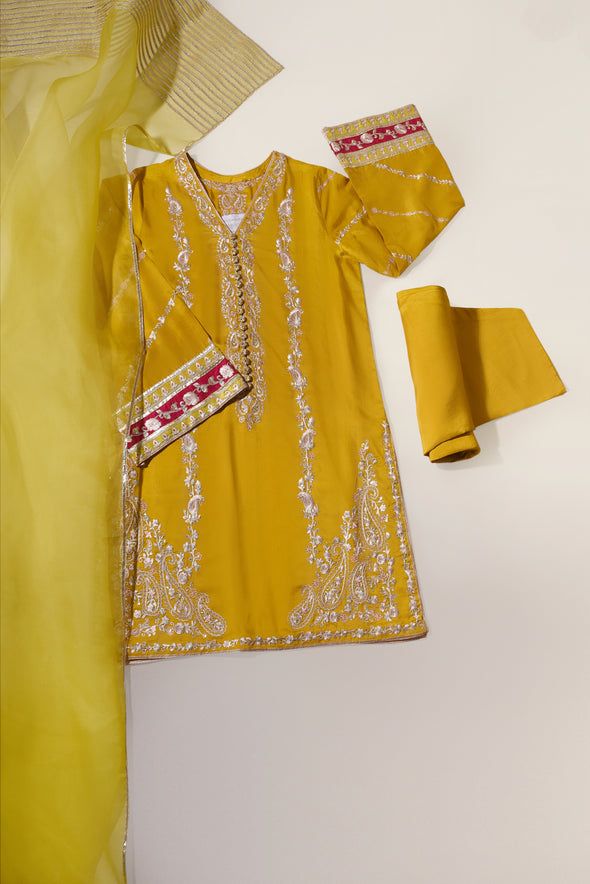 Curated on pure raw silk 58 Gms in an alluring tone of poison green, this design features hand/ada work done by our expert artisans alongside embroidered details. An absolutely beautiful three piece for your festive events. The length of the long kameez is 46 inches. Order Duration: 4 to 6 weeks Yellow Silk Sharara With Dabka Work, Yellow Raw Silk Anarkali Set With Dabka Work, Yellow Silk Sharara With Dabka, Yellow Silk Sharara With Dabka Details, Pista Green Silk Sharara For Eid, Yellow Silk Traditional Wear With Dabka Work, Elegant Yellow Kurta With Mirror Work, Yellow Raw Silk Dress For Wedding, Yellow Raw Silk Kurta With Dabka