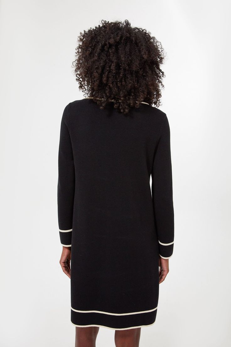 A chic, just-add-flats shirtdress for work, weekends, and beyond. The Black Eleonora Dress fully embodies Parisian style with its crisp tailored silhouette, clean lines, spread collar, and quarter length placket that lends itself to elevated, yet casual wear. Cut from soft, stretch fabric that won't lose its shape over time, this mini is easy to wear all day long, from morning meetings to early evening happy hours. Effortless and sophisticated, this is the ideal number that suits many occasions Classic V-neck Shirt Dress For Work, Black Dress With Hidden Button Closure For Work, Business Dresses With Collar And Placket, Formal Collared Shirt Dress With Placket, Business Collared Dresses With Placket, Black Collared Dress For Business, Elegant Collared Shirt Dress With Placket, Sleek Long Sleeve Shirt Dress For Work, Collared Neckline Shirt Dress With Placket For Workwear