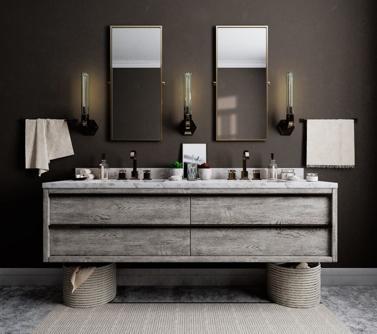 a bathroom with two sinks and mirrors on the wall