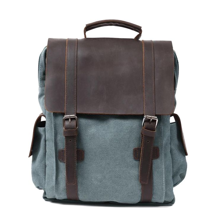 Elevate your everyday look with this small canvas backpack. This classic rucksack blends rugged charm with practical features for a stylish and functional accessory. Rustic Elegance: Crafted from blue cotton canvas and genuine leather, this backpack adds a vintage touch to any outfit. Modern Convenience: Despite its retro design, this backpack includes waterproof protection and quilted pockets for your phone and laptop. Unique Character: The vintage materials age beautifully, giving each backpac Backpack Drawing, Travel Camera Bag, Leather Backpack Handbag, Canvas Laptop Bag, Tactical Wallet, Leather School Backpack, Fishing Shoes, Canvas Backpacks, Leather Making