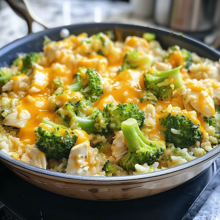 broccoli and cauliflower casserole with cheese in a skillet