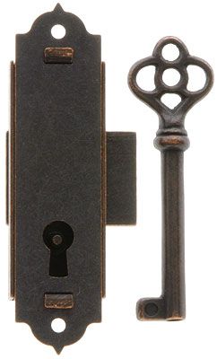 an old style door handle with a key on the front and back side of it