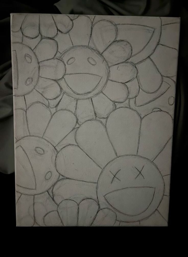 this is a drawing of some flowers on a piece of paper that has been drawn